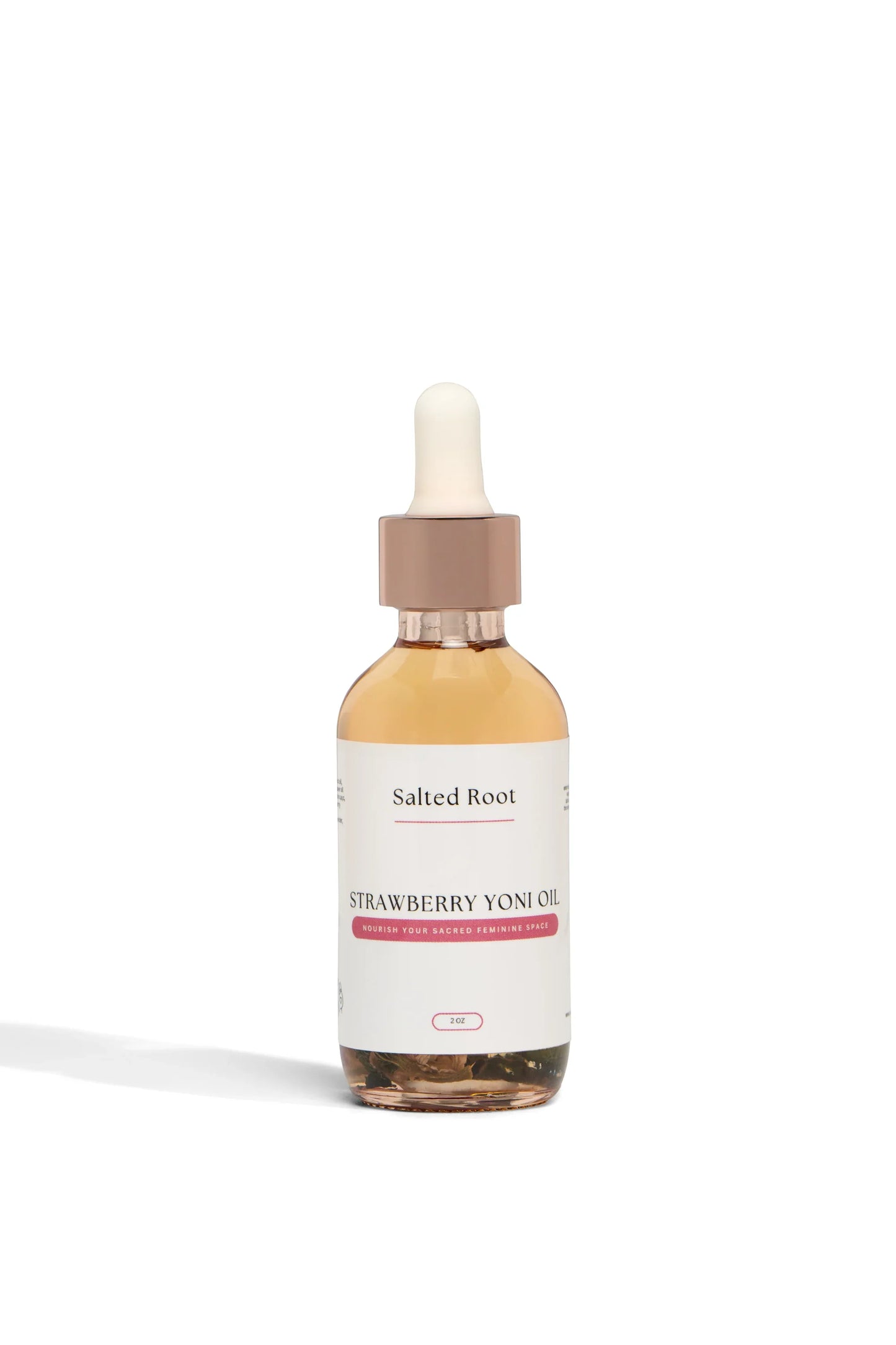 Bottle of Salted Root Strawberry Yoni Oil on a white background